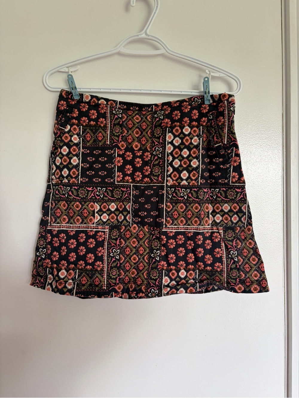 Hollister Black Mini Skirt with Coral and Green Patchwork Floral